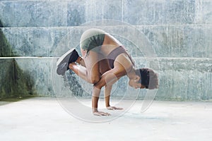 Melanesian pacific islander athlete girl with afro performing exercising routines