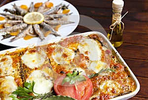 Melanzane alla Parmigiana and Marinated sardines