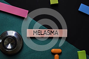 Melasma text on sticky notes. Office desk background. Medical or Healthcare concept photo