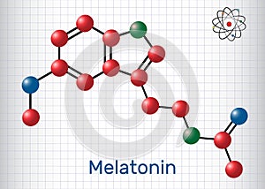 Melatonin molecule, sleep hormone. Atoms are represented as spheres with color: carbon (red), oxygen (blue), nitrogen (green). Mo photo