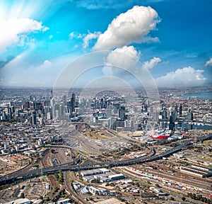 Melbourne aerial city view with skyscrapers, railway and interstate road