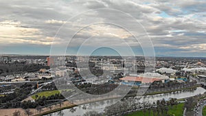 MELBOURNE, AUSTRALIA - SEPTEMBER 6, 2018: Aerial view of cityscape at sunset. More than 15 million tourists visit Melbourne