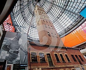 Melbourne Central shot tower with huge advertisment of Roger Federer