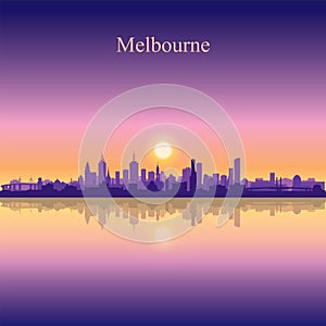 Melbourne city silhouette on sunset background