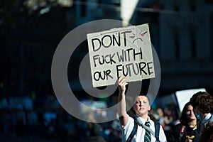 School child protesting against climate change in Melbourne