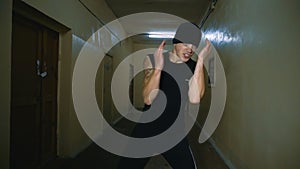 Melee attack a young man in an abandoned corridor