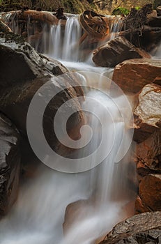Melincourt Brook waterfall and rusty wheel