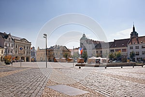 Melnik, Czech republic - September 29, 2017: historical buildings on Namesti Miru square with pavement on foreground