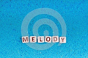 Melody word on stone