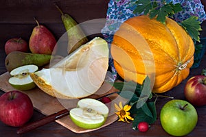 Melon on rustic wooden background