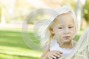 Meloncholy Portrait of Cute Little Girl Outside