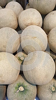 Melons on display in a window at a local traditional market