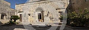 Melpignano. Greek city. Typical house with internal courtyard in Lecce stone photo