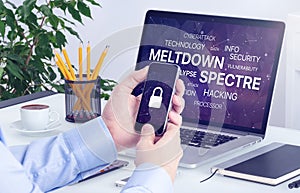 Meltdown and spectre threat concept on laptop and smartphone screen