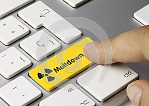 Meltdown - Inscription on Yellow Keyboard Key photo