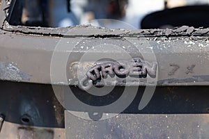 A melted emblem on a car