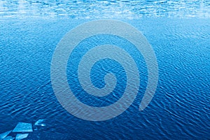 Almost melted ice on river background