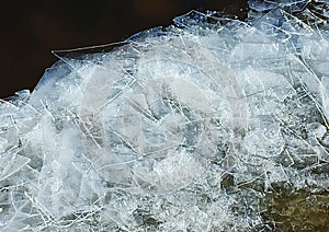 Melted ice in the spring on the river - close-up