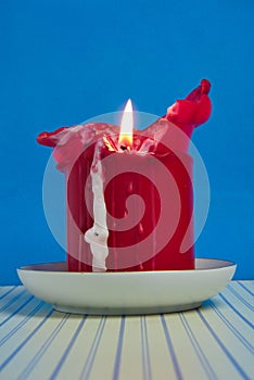 melted red candle photo
