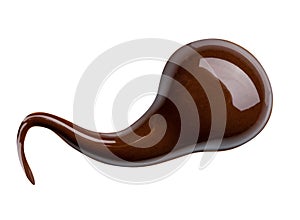 Melting chocolate drips. Chocolate isolated on white background.