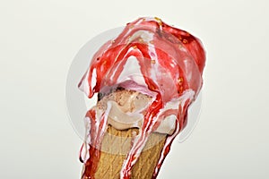 Melting ice cream in a cone