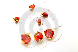 Melting ice cream in waffle tartlets with strawberries on white background. National ice cream day 19 july concept. Creative copy