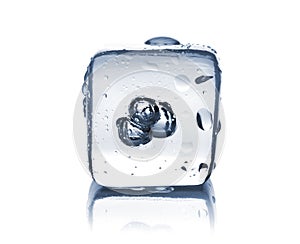 Melting ice cube with water dew