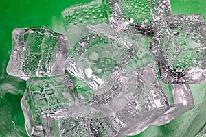 Melting ice cubes closeup on