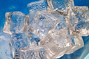 Melting ice cubes closeup on