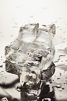 Melting ice cubes with drops and