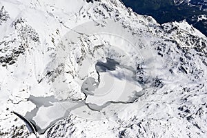 Melting ice of Gemelli lakes, Orobie, Italy