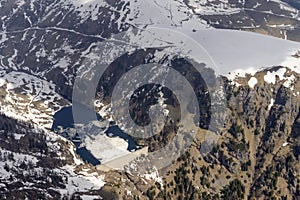 Melting ice of San Marco lake, Orobie, Italy