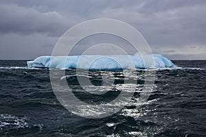 Melting Iceberg in Arctic ocean