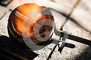 Melting ingots in a crucible photo