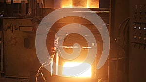 Melting of metal in a steel plant. Factory for the manufacture of metal pipes