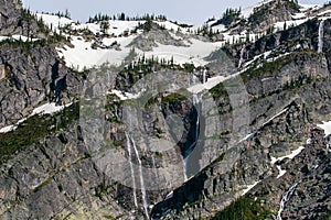 Melting snow creating waterfalls.