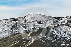 Melting snow on the slopes of the mountains