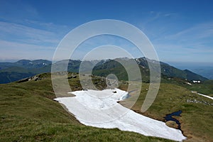 Melting snow on summit