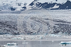 Melting tongue of the Breidamerkurjokull glacier summer season white ice