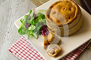 Melton Mowbray pork pies on plate photo