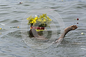 Member of the candomble religion participates in a party in honor of Yemanja photo