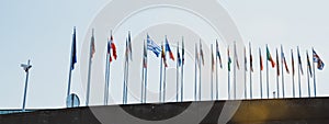 The Member States of the European Union flags waving in wind