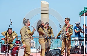 Members of the Army Music Group perform in the city of Haifa in honor of the 70th anniversary of the independence of the State of