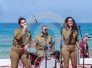 Members of the Army Music Group perform in the city of Haifa in honor of the 70th anniversary of the independence of the State of