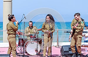 Members of the Army Music Group perform in the city of Haifa in honor of the 70th anniversary of the independence of the State of