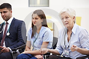 Members Of Medical Staff In Meeting Together