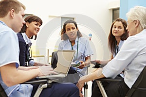 Members Of Medical Staff In Meeting Together