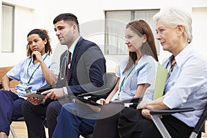 Members Of Medical Staff In Meeting Together