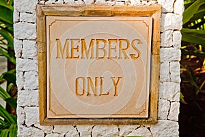 A members only sign at a resort