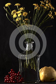 Memento Mori. Still life of a skull, viburnum, a glass bottle with a bouquet